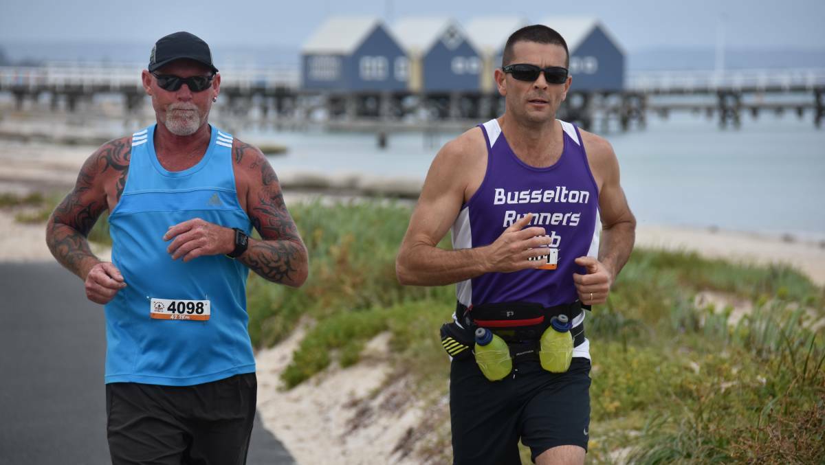Greg Benson and Denis Price compete in a marathon along the stunning Busselton foreshore. Image Emma Kirk.