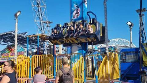 Four-year-old Tristan Curtis, far right, was photographed by an onlooker on the Easter Show's "Free Fall" ride on Sunday, Photo: Facebook.
