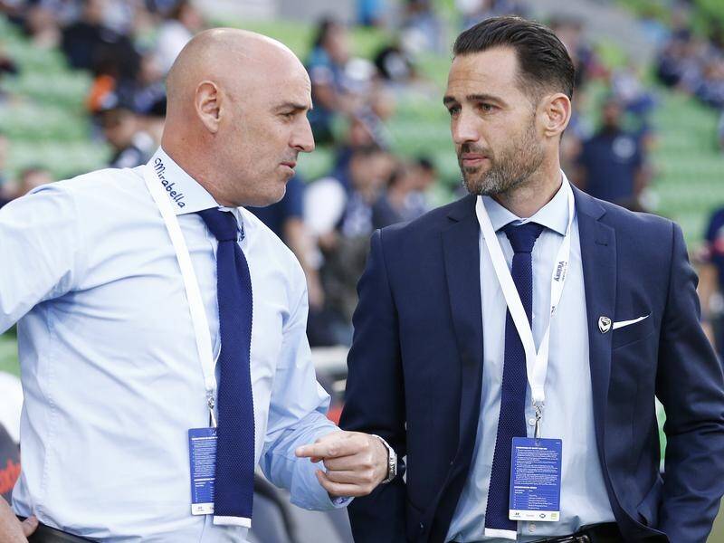 Retiring Carl Valeri (r) has backed coach Kevin Muscat to return Melbourne Victory to the top.