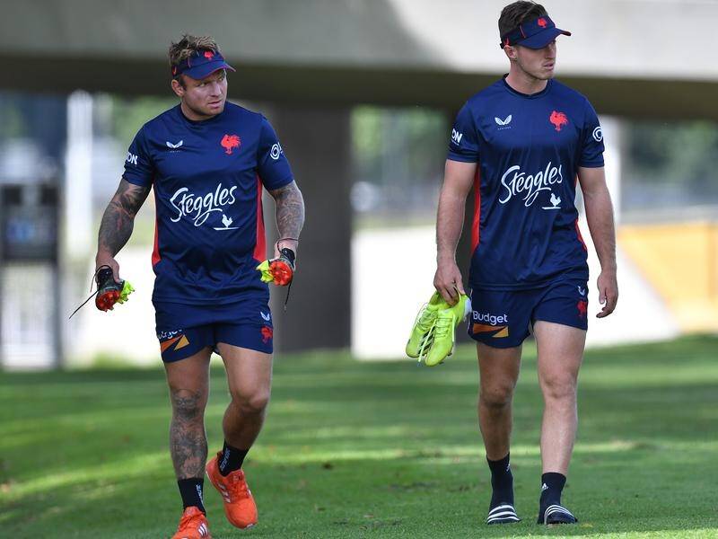Jake Friend (left) is keen to mentor the Sydney Roosters' young hookers like Sam Verrills.