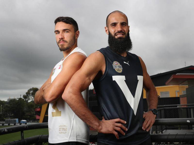 Richmond's Shane Edwards (L) and Bachar Houli line up in the Victorian and All-Stars AFL jumpers.