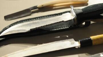 Queensland reforms will ban the sale of items such as knives, axes and machetes to anyone under 18. (Julian Smith/AAP PHOTOS)