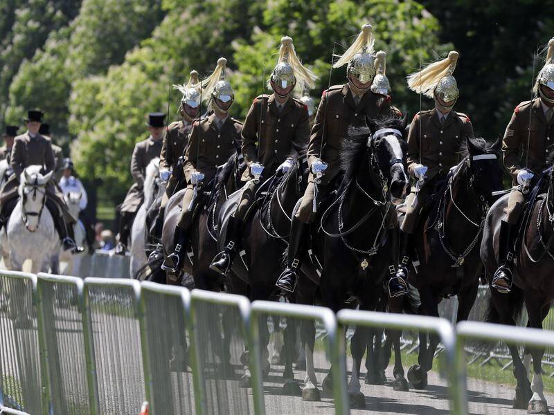A carriage procession drives along Long Walk during a rehearsal for the Royal Wedding in Windsor