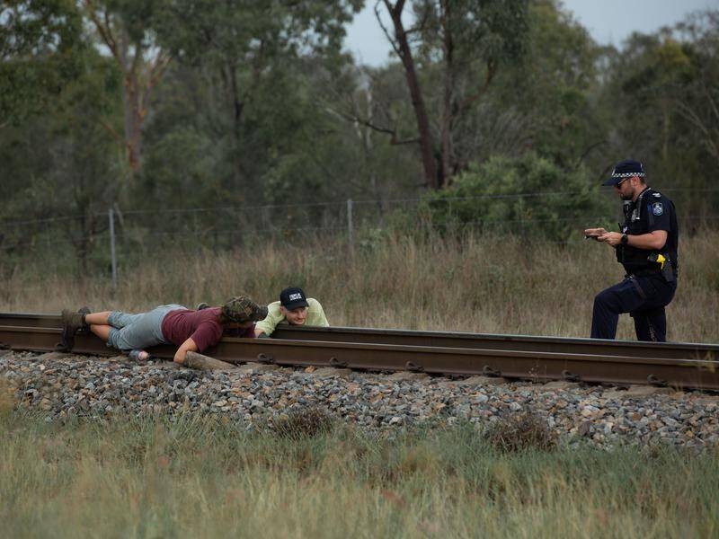 Activists this week locked themselves to tracks in a bid to stop a Bravus coal train in Queensland.