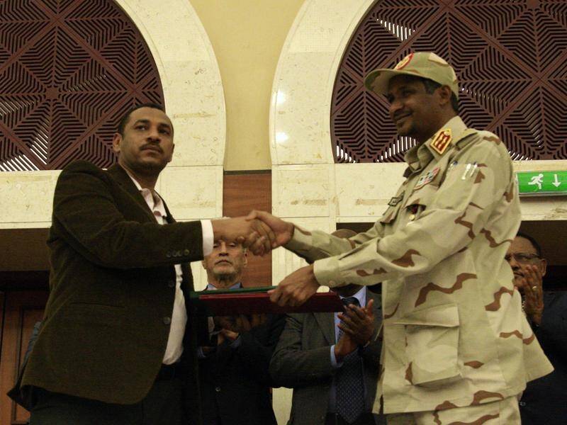 Sudan's ruling military council and the opposition have signed a political accord.