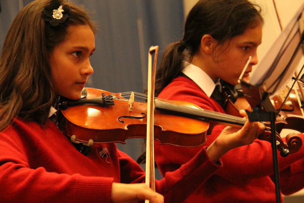 Tune: Rhiannon and Kiran Van Der Tang playing at the Cornerstone Christian College music concert