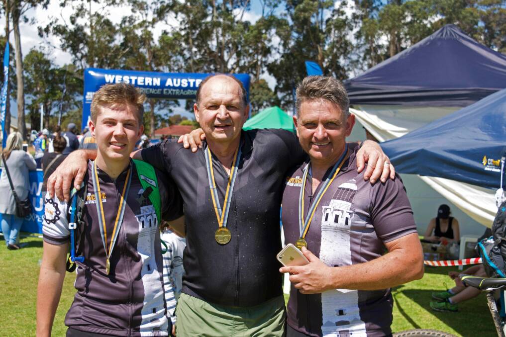 Precious moments: Christiaan and Johan Pienaar with Corey Verwey at the Cape to Cape MTB event in Margaret River. Photo: Supplied.