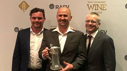 Winemaker Glen Goodall (centre) with the coveted Jimmy Watson Memorial Trophy. 
