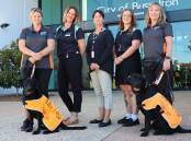 Guide Dog WA Trainers with City of Busselton staff and newly-boarded Guide Dogs, Louie and Thia. Picture supplied. 