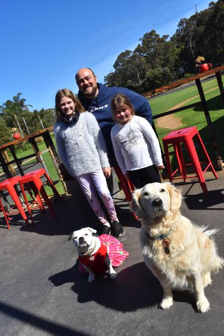 The Wedding DJ, Ryan Cope with daughters Matilda (DJ MC) and Adelaide and a couple of furry friends get ready for a family day in the sun with the Yahava Santa Paws event this Sunday. 