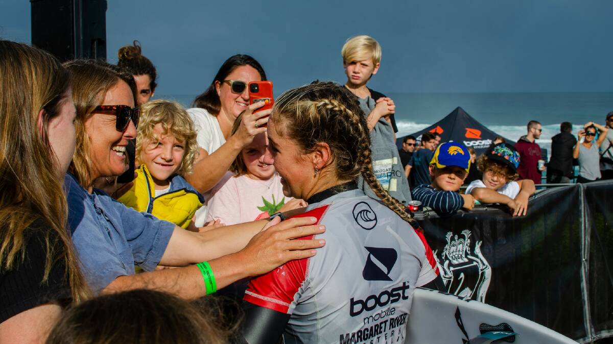 Willow Hardy is greeted by fans and supporters at Surfers Point. Photos: Thea McDonald-Lee 