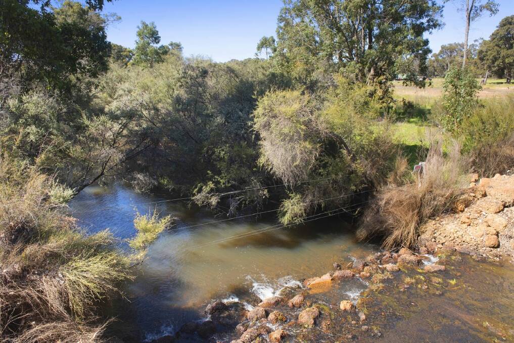 Residents say the land at 369/409 Gale Road is frequently flooded and that building a school on the property would present a number of environmental and safety issues. Picture: realestate.com.au