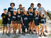 World Surf League surfers joined Nature Conservation and local community members to work on dune restoration projects as part of the WSL One Ocean program. Picture via WSL. 