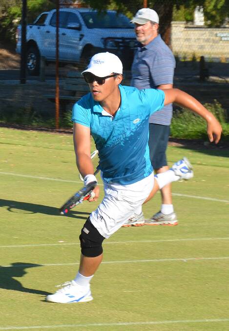 Twilight tennis: Simon Chae enjoying a hit last Sunday. Photo: supplied.