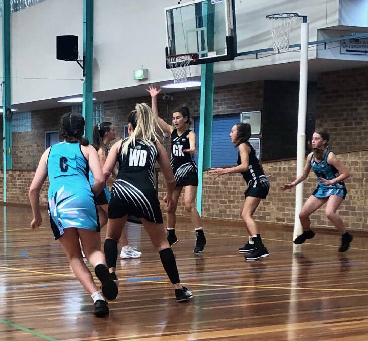 Under 16s: Magpies' Dakota Nelmes, Kalani Bate-Henry and Elle Mullumby showing their defensive skills on the court against Australind. Photo: Supplied.