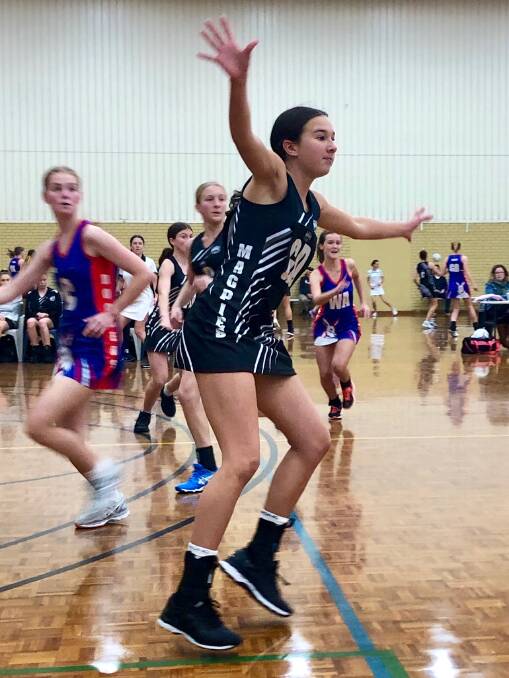 Defensive skill: Kalani Bate-Henry who made a remarkable intercept during the final term of the 16s game against Eaton Boomers. Photo: Supplied.