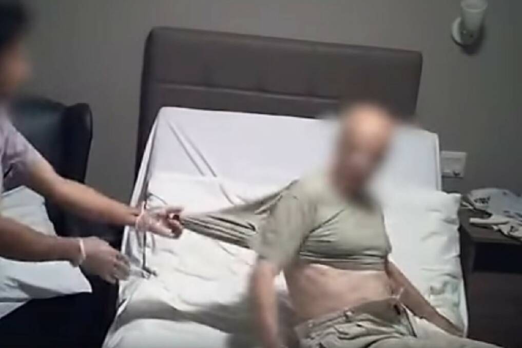 An elderly patient at a NSW nursing home is pulled by his tee shirt and later hit with a shoe by an aged care worker in a case in September 2018.